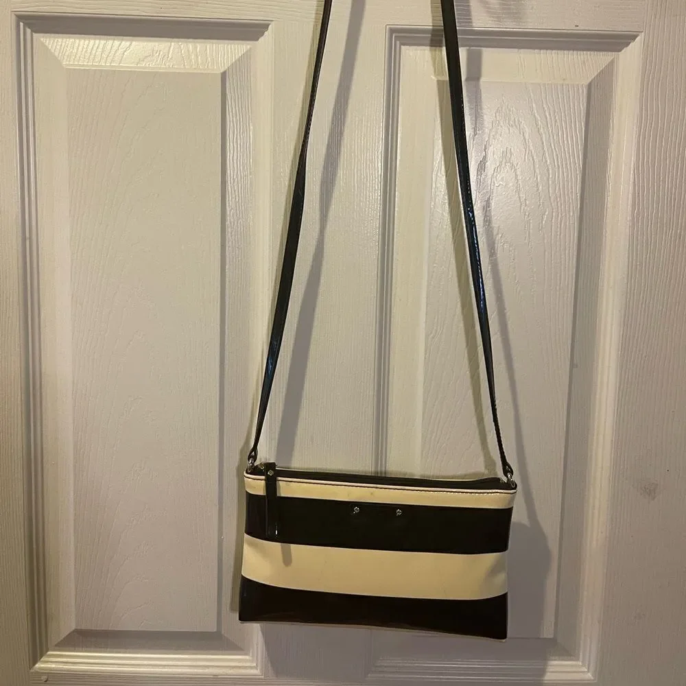 Kate Spade patent Black and Cream Striped small Crossbody Bag.